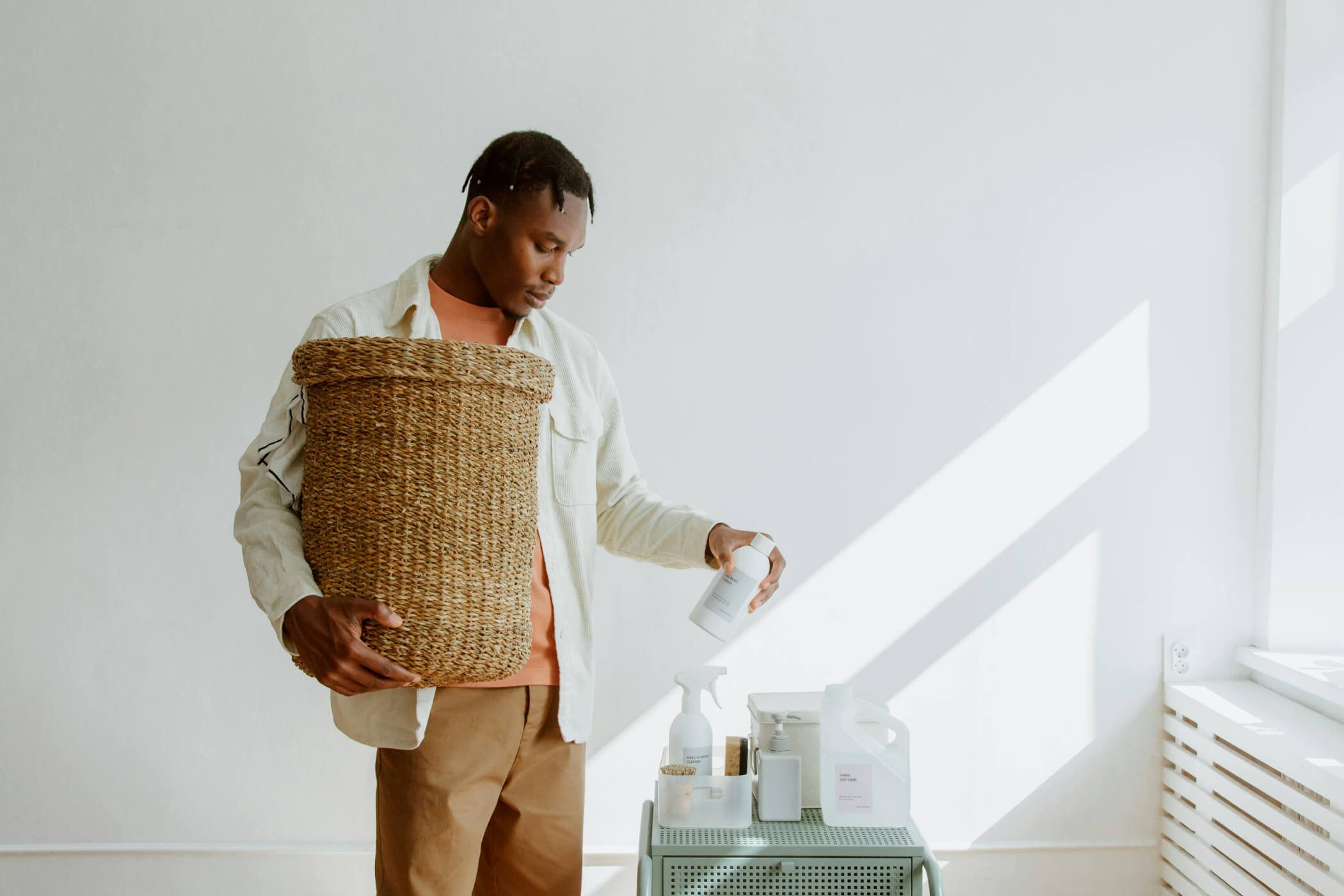 African man doing laundry