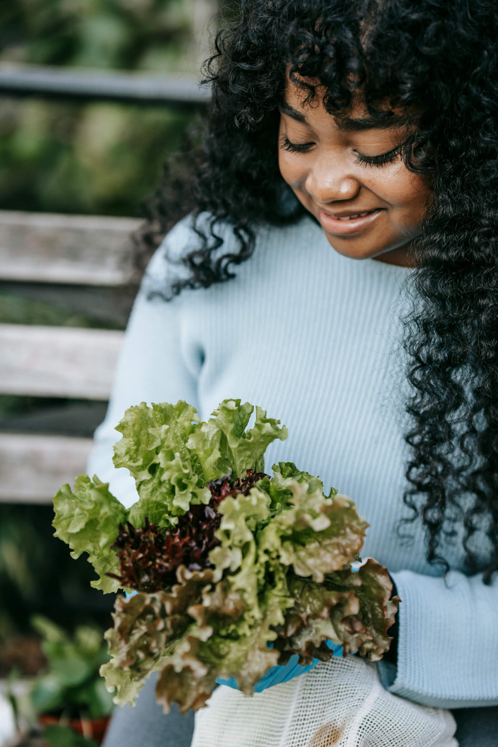 Woman looking at fresh veggies